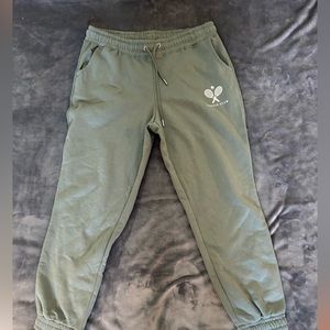 Green tennis club joggers